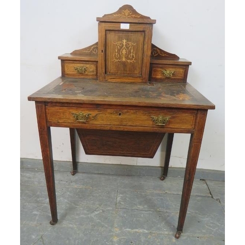 743 - An Edwardian rosewood ladies writing desk, having marquetry inlay and satinwood strung, the upper ga... 