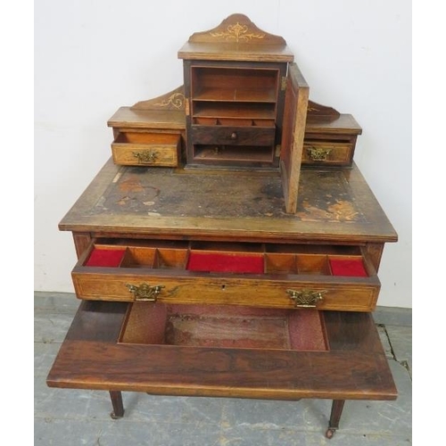 743 - An Edwardian rosewood ladies writing desk, having marquetry inlay and satinwood strung, the upper ga... 