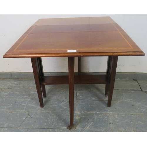 748 - An Edwardian mahogany Sutherland table, crossbanded with walnut and stung with boxwood and ebony, on... 