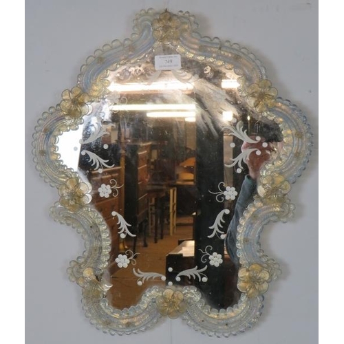 749 - A vintage Venetian wall mirror of traditional form with applied and etched decoration.
H50cm W42cm (... 