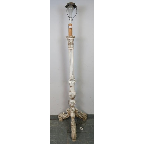 752 - An ornate vintage standard lamp in the Florentine taste painted white, the fluted column on acanthus... 