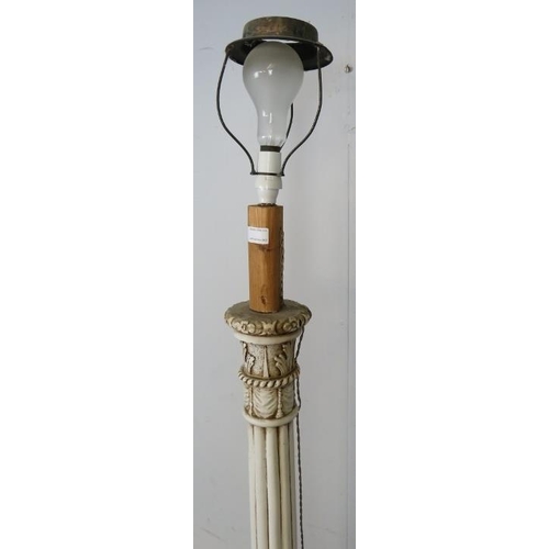 752 - An ornate vintage standard lamp in the Florentine taste painted white, the fluted column on acanthus... 