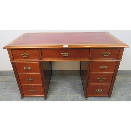 758 - An Edwardian mahogany child's pedestal desk, inset red leather top above configuration of 9 drawers ... 