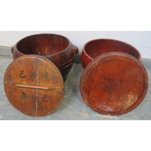 759 - Two vintage Asian lacquered wood rice boxes and covers.
H25cm Diameter 36cm (approx).