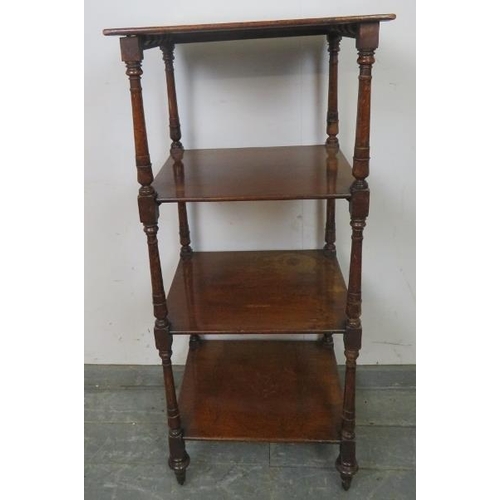 760 - A 19th century mahogany four-tier whatnot, with turned uprights, raised on casters.
H114cm W51cm (ap... 