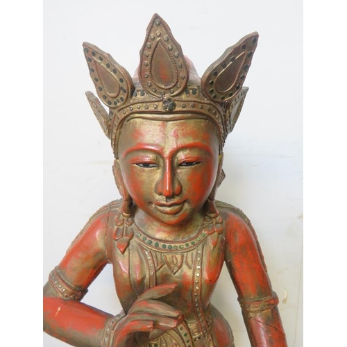 765 - A vintage Eastern lacquered & metal-mounted carved wooden figure.
H87cm (approx).