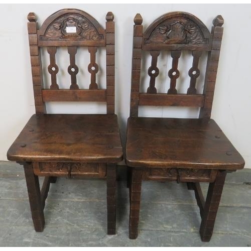 766 - A pair of 17th century style fruitwood child's chairs, 20th century. Having carved top rails and fit... 