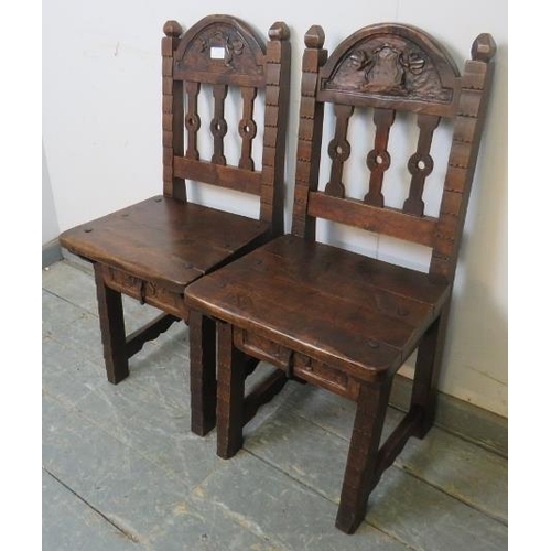 766 - A pair of 17th century style fruitwood child's chairs, 20th century. Having carved top rails and fit... 