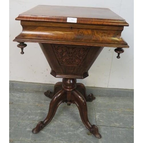 768 - A good Victorian burr walnut pedestal work/sewing table, the hinged lid enclosing a nicely fitted in... 