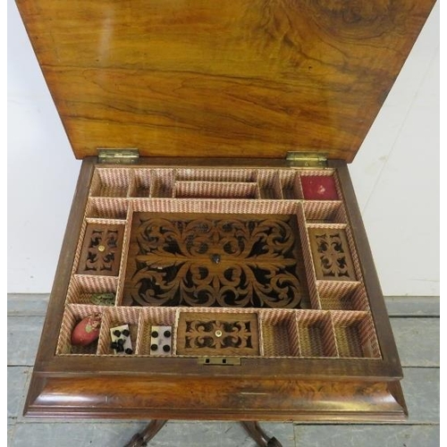 768 - A good Victorian burr walnut pedestal work/sewing table, the hinged lid enclosing a nicely fitted in... 