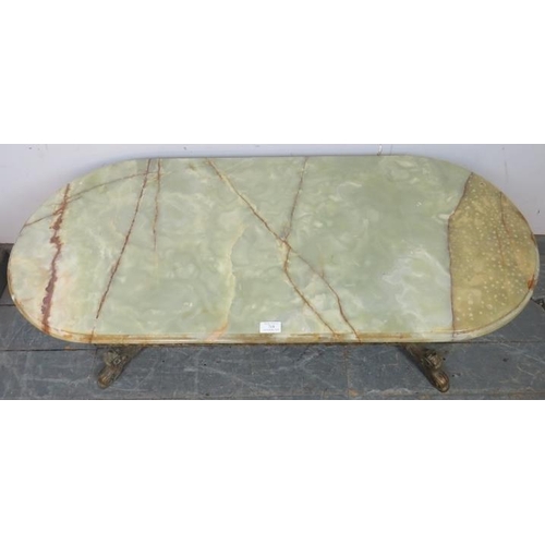 769 - A c.1970's green onyx & gilt-metal coffee table.
W114cm H44cm (approx).