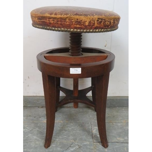 776 - A Victorian mahogany music stool, with circular height adjustable seat, (a/f).