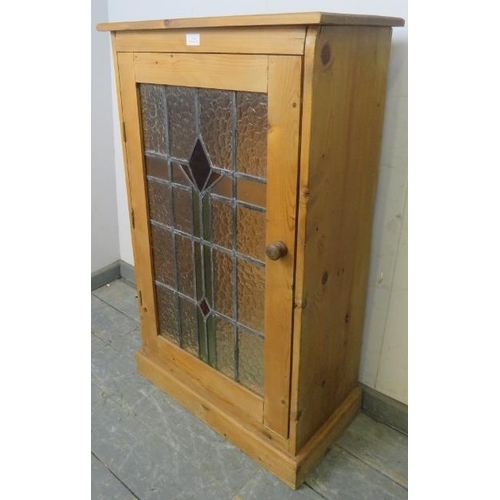 786 - A period-style stripped pine side cupboard, illuminated interior, glass shelves enclosed by stained ... 