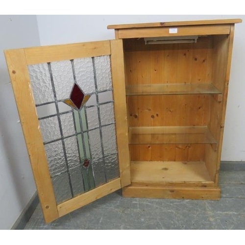 786 - A period-style stripped pine side cupboard, illuminated interior, glass shelves enclosed by stained ... 