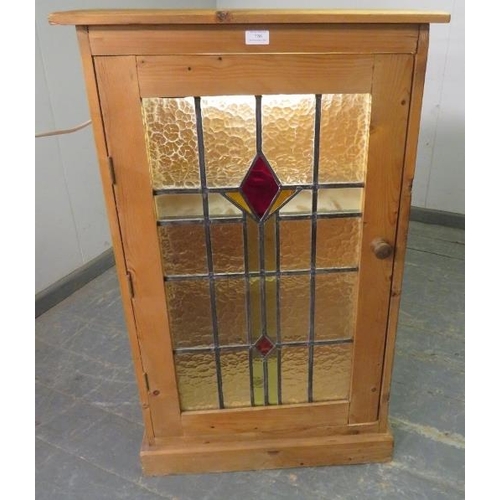 786 - A period-style stripped pine side cupboard, illuminated interior, glass shelves enclosed by stained ... 