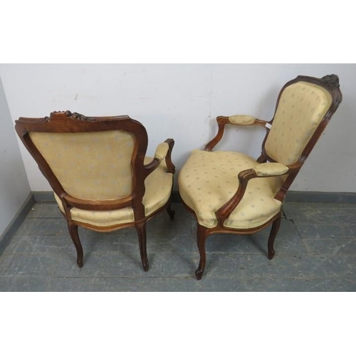 789 - A pair of vintage French Louis XV style carved show-wood open-sided armchairs, upholstered in patter... 