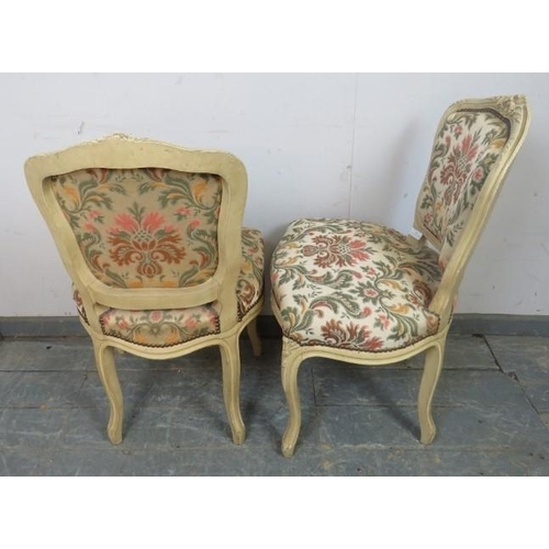 791 - A pair of vintage French side chairs in the Louis XV style, cream painted carved wood frames, classi... 