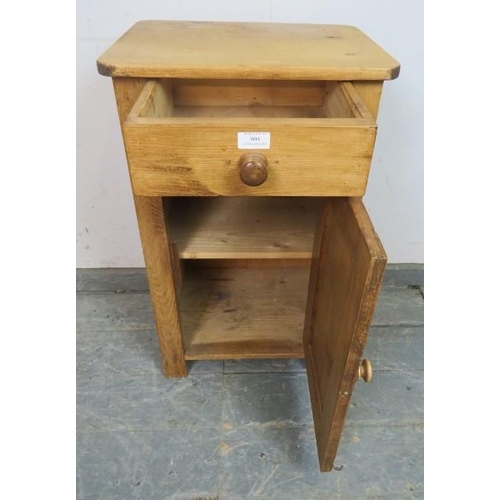 804 - A vintage stripped pine bedside cabinet, single drawer above panelled cupboard door, 45cm wide x 74c... 