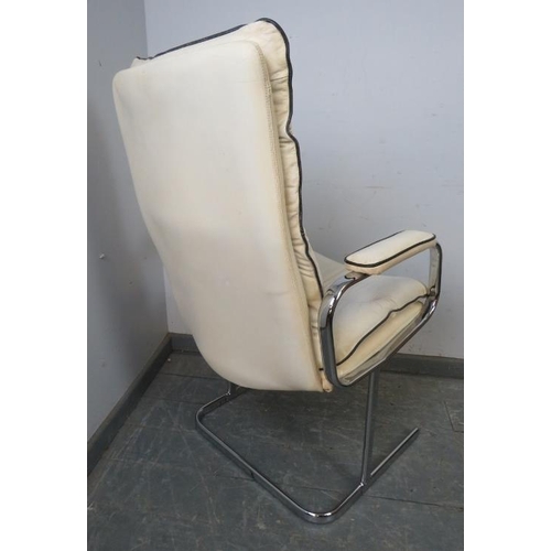 806 - A vintage mid-century desk chair in the manner of Pieff, upholstered in white leather with black pip... 