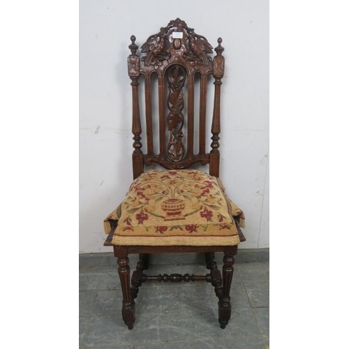 809 - A 19th century Carolean Revival carved oak single chair/hall chair, with caned seat and machined tap... 