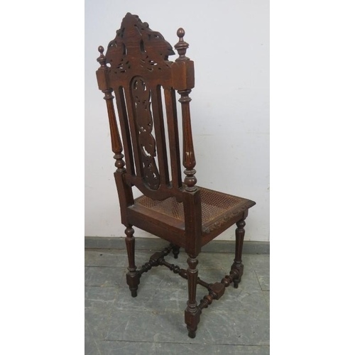 809 - A 19th century Carolean Revival carved oak single chair/hall chair, with caned seat and machined tap... 