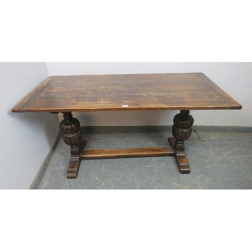 815 - An early 20th century Elizabethan revival carved oak refectory/dining table rectangular top above so... 