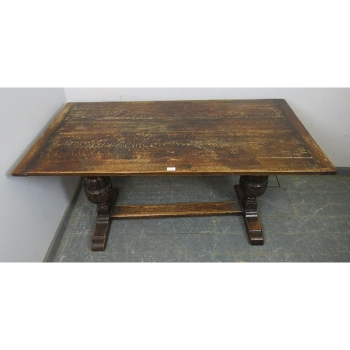 815 - An early 20th century Elizabethan revival carved oak refectory/dining table rectangular top above so... 