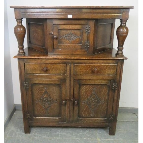 817 - A good solid early 20th century court cupboard in the late 17th century style, good carved panels, n... 