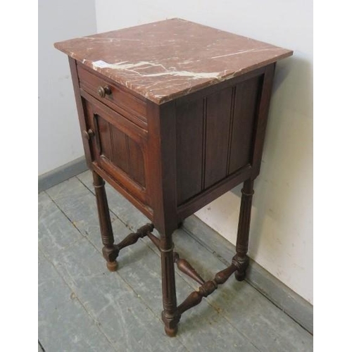 822 - A vintage French fruitwood bedside cabinet with rouge marble top above single drawer and panelled cu... 