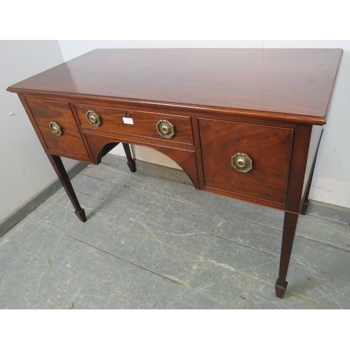 826 - A 19th century mahogany writing desk, having one short drawer flanked by two cock-beaded deep drawer... 