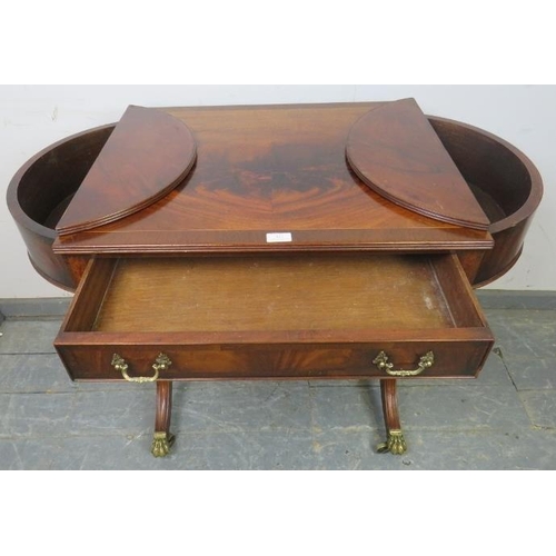 841 - A Regency Period style feathered mahogany side table, 20th century, the cross-banded rectangular top... 