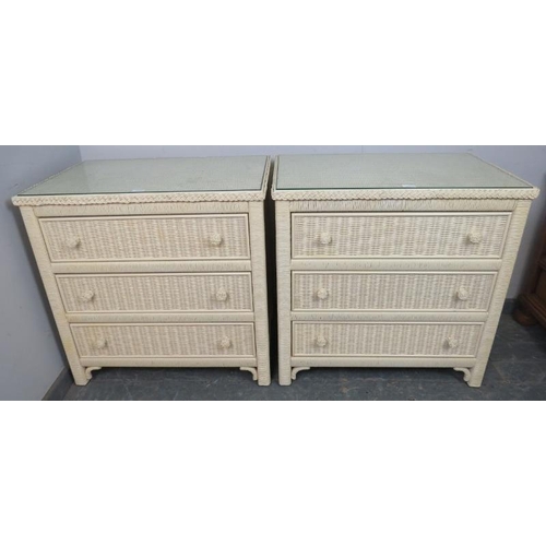 846 - A pair of contemporary American cream finished Loom chests, wooden carcases, each with glass top abo... 