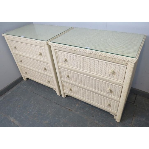 846 - A pair of contemporary American cream finished Loom chests, wooden carcases, each with glass top abo... 