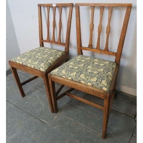 876 - A pair of Georgian light mahogany occasional chairs with drop-in seat pads re-upholstered in William... 