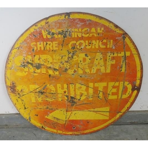 878 - A vintage double-sided steel sign painted in yellow and orange with the slogan ‘Warning Australian s... 