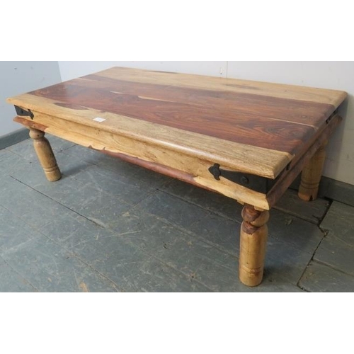 885 - An Eastern Jali wood rectangular coffee table, with metal bound corners, on turned supports. 
H40cm ... 