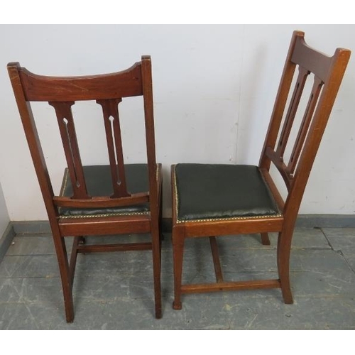 888 - Four Arts & Crafts mahogany dining chairs by Maple & Co, having pierced backrests and seats upholste... 