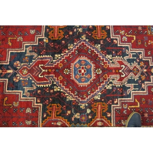 901 - A fine North West Persian Zan Jan rug, central pattern on deep red ground with indigo spandrels. 205... 