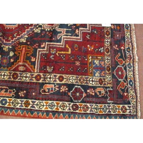 901 - A fine North West Persian Zan Jan rug, central pattern on deep red ground with indigo spandrels. 205... 