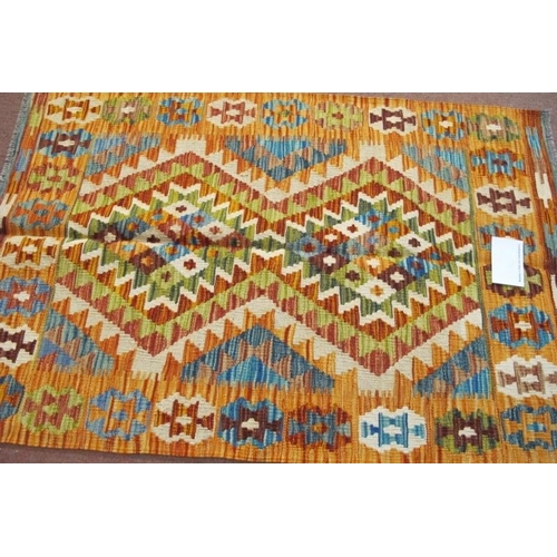 915 - A fine Chobi Kilim rug, central interlocking diamond pattern with strong colours and good condition.... 