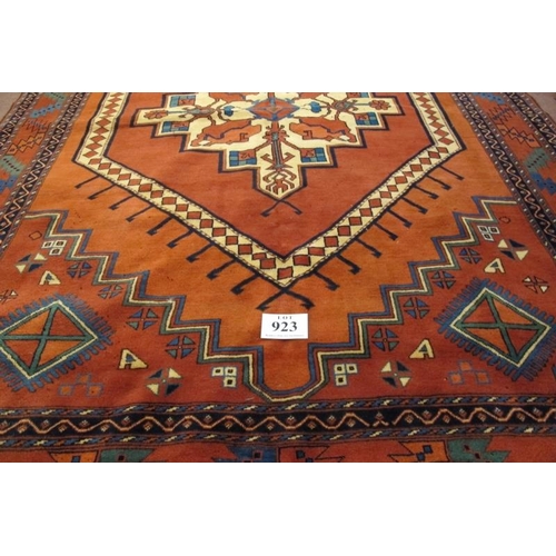 923 - A Fine 20th Century Turkish Afghan Kunduz carpet.  Central Medallion on red/burnt amber ground flank... 