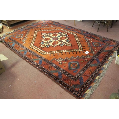 923 - A Fine 20th Century Turkish Afghan Kunduz carpet.  Central Medallion on red/burnt amber ground flank... 