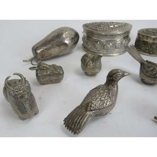 94 - A collection of Southeast Asian silver containers, 20th century. Comprising seventeen boxes of varyi... 