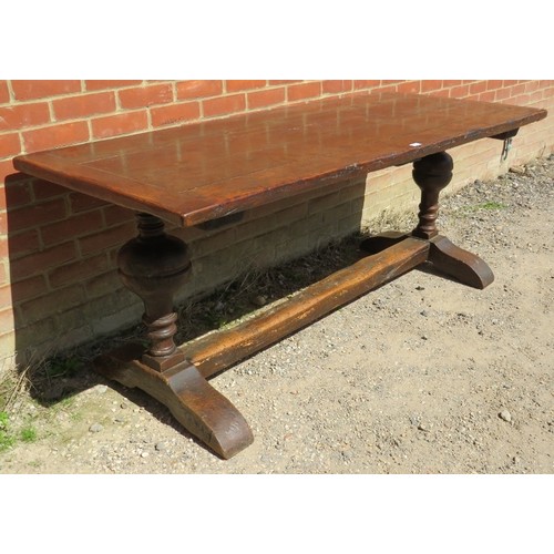 850 - An antique solid oak refectory/dining table in the 17th century style, the four-plank top with cleat... 