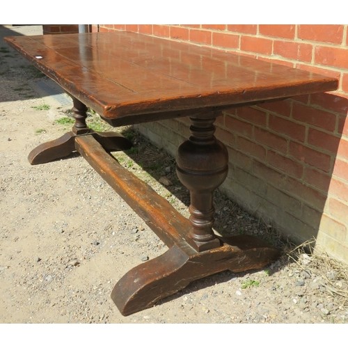 850 - An antique solid oak refectory/dining table in the 17th century style, the four-plank top with cleat... 