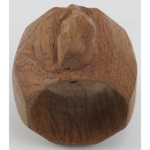 104 - A Robert Thompson of Kilburn 'Mouseman' octagonal oak napkin ring with mouse carved in relief. 3.7 c... 