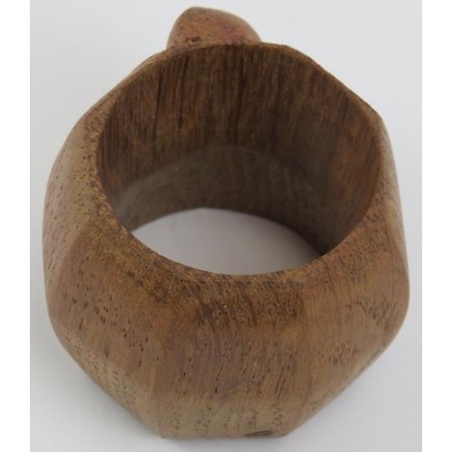 104 - A Robert Thompson of Kilburn 'Mouseman' octagonal oak napkin ring with mouse carved in relief. 3.7 c... 