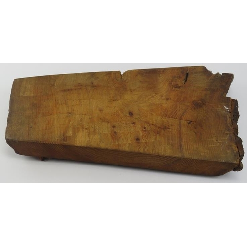 105 - A vintage oak cheeseboard, 20th century. Relief decorated with fruit and foliage, the scroll inscrib... 