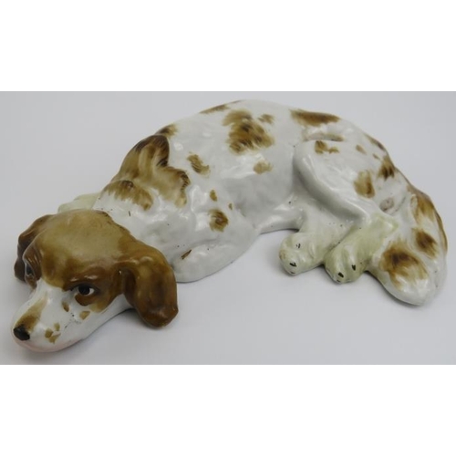 107 - A group of English and European ceramic dalmatian, poodle and spaniel dog figurines, 20th century.  ... 