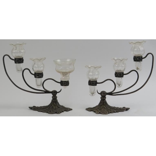 124 - A pair of F & C Osler cast metal and glass three branch epergnes, circa 1900. Each epergne modelled ... 